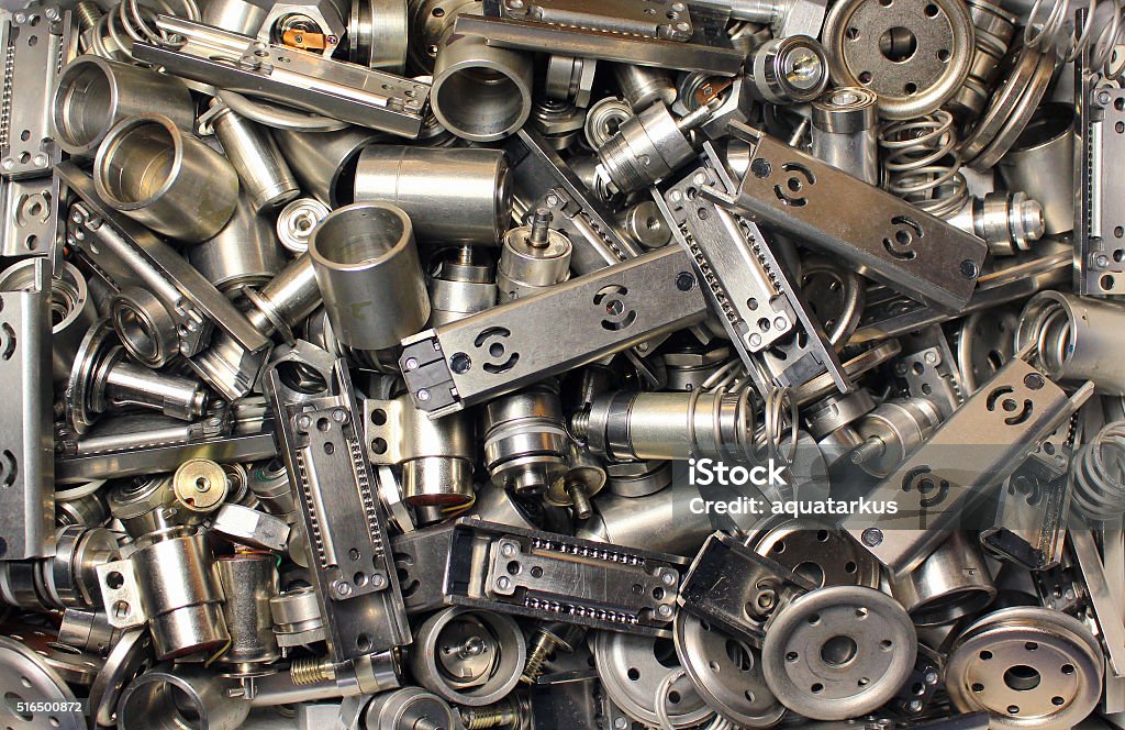 Scattered parts of old disassembled hard drives. Scattered parts of old disassembled hard drives Ball Bearing Stock Photo