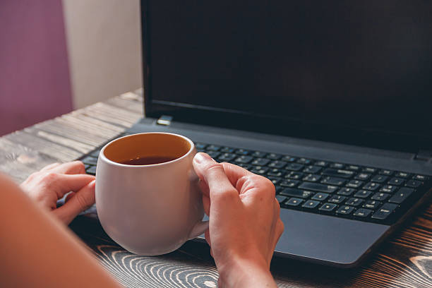 istock woman typing on laptop 516502882
