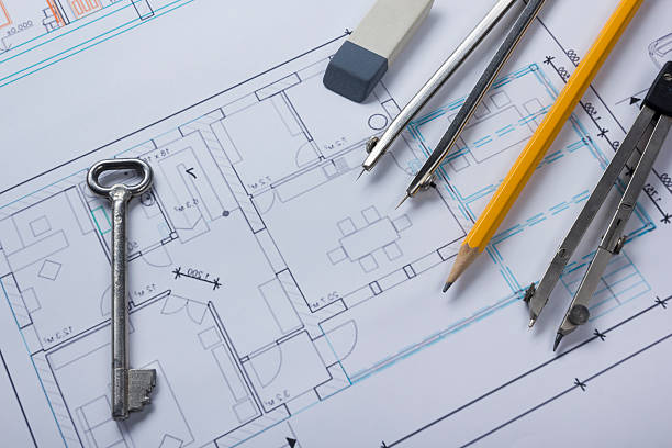 istock Architect worplace top view. Architectural project, blueprints, blueprint rolls and 516504348