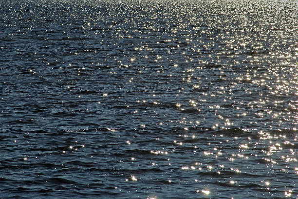istock Sun glare on the water 516505269