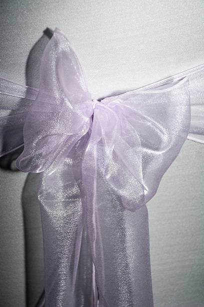 istock Purple Bow On White Chair 516505839