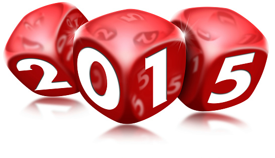 Three red dice with the written 2015 and reflections