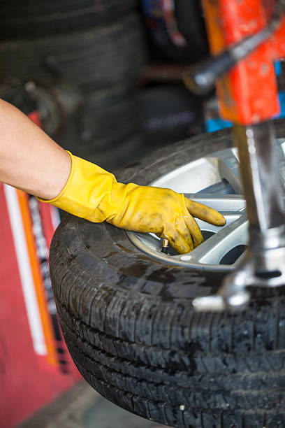 istock tire repair in the workshop 516509093