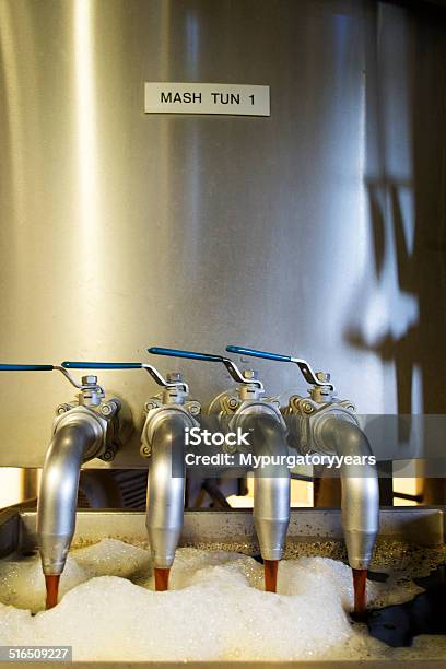 Beer Flowing Out Of Mashtun Stock Photo - Download Image Now - Adult, Alcohol - Drink, Bar - Drink Establishment