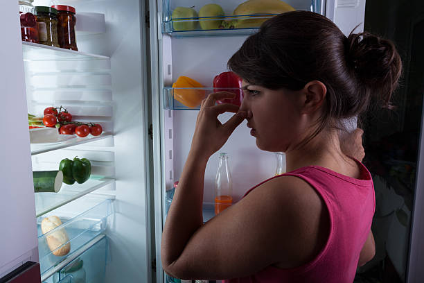 istock Woman holding nose 516511619