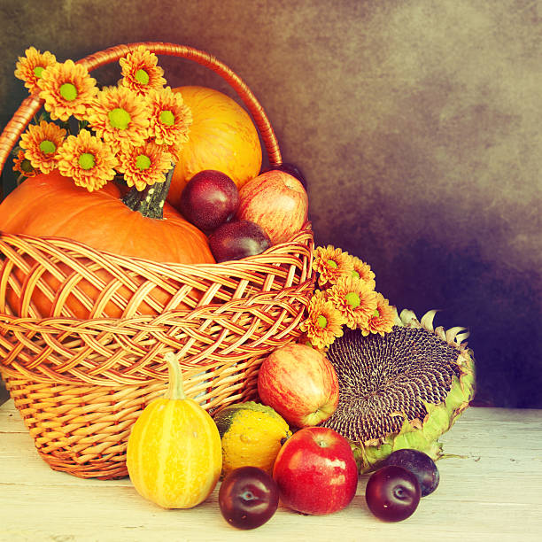 istock Autumn nature concept. Fruit and vegetables on wood. 516511639