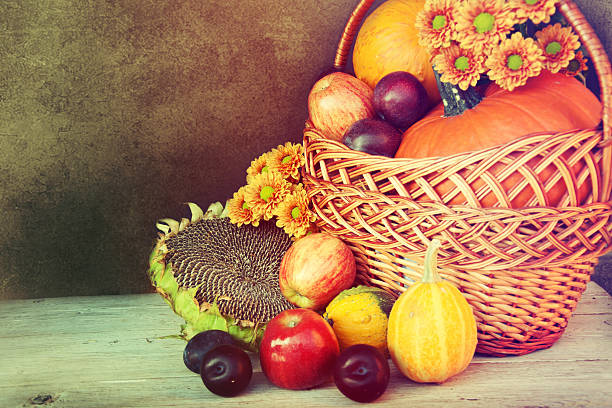 istock Autumn nature concept. Fruit and vegetables on wood. 516511643