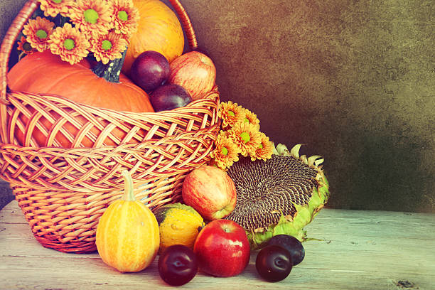 istock Autumn nature concept. Fruit and vegetables on wood. 516511645