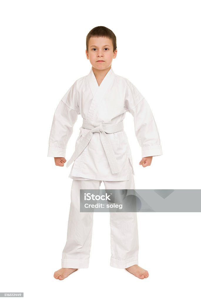 boy in white kimono posing Aikido Stock Photo
