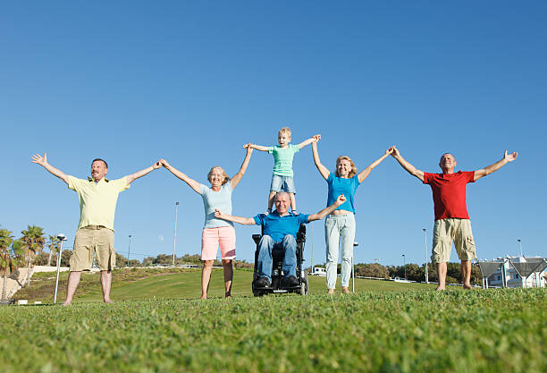 istock Disabled Man with family outside. 516512847