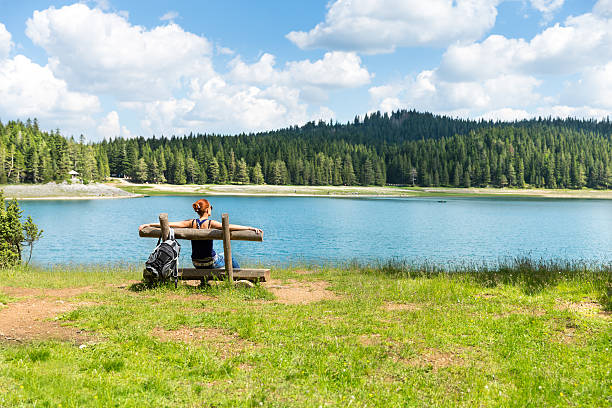 istock Traveler woman rests on the bench 516526845