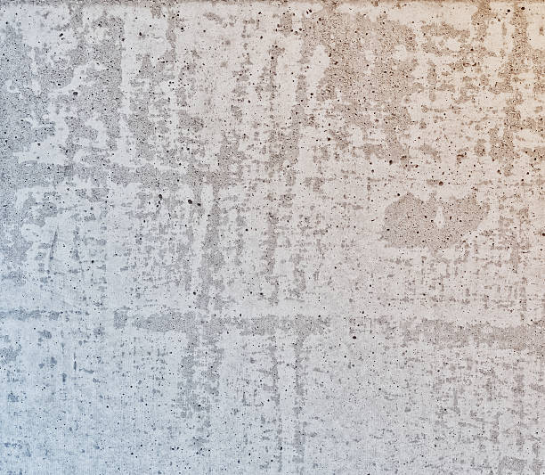 istock white concrete wall with sun flare 516528173