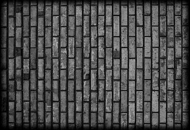 istock Background of dark black brickwall texture. 516528599