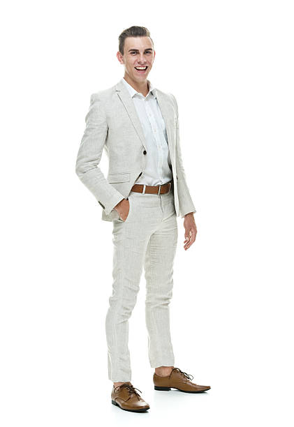 istock Happy smart casual man standing with hand in pocket 516531825