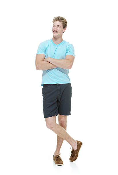 istock Smiling casual man standing with arms crossed 516533465