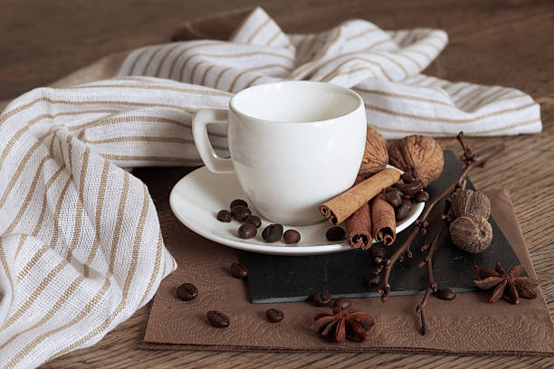 istock Cup of hot coffee and themed items around it. 516543194
