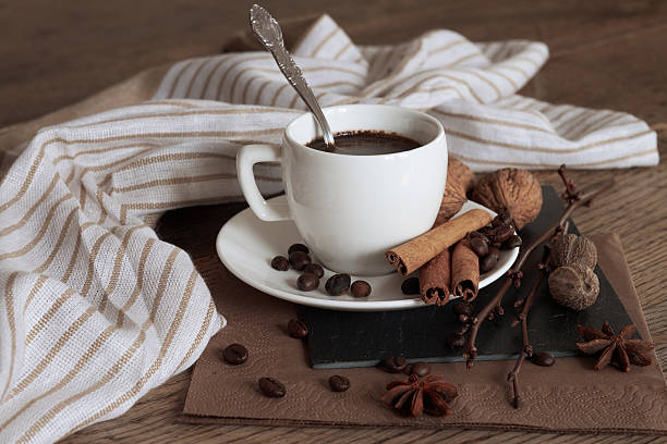 istock Cup of hot coffee and themed items around it. 516543678