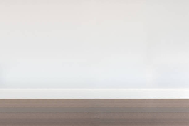 istock empty room with wooden floor and white wall 516545530