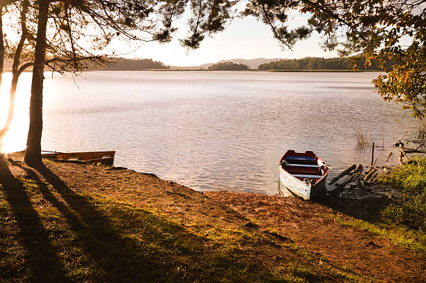istock Boats at sunset by the lake, Chiapas, Mexico 516545882