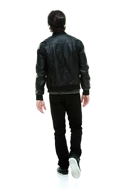 istock Rear view of man walking 516545949