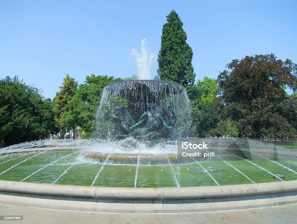 well in Dresden sunny summer scenery including a big fountain seen in Dresden Bush Stock Photo