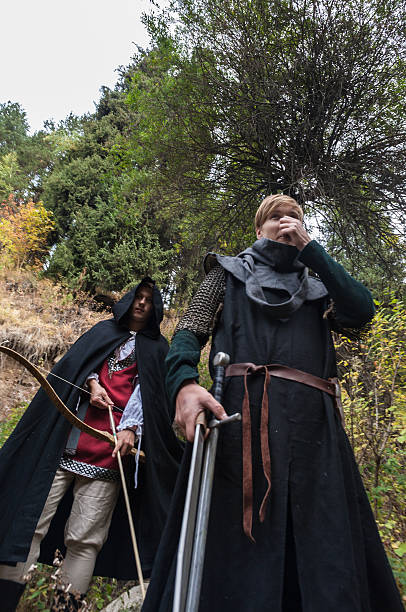istock Man in historical costume in the forest 516548321