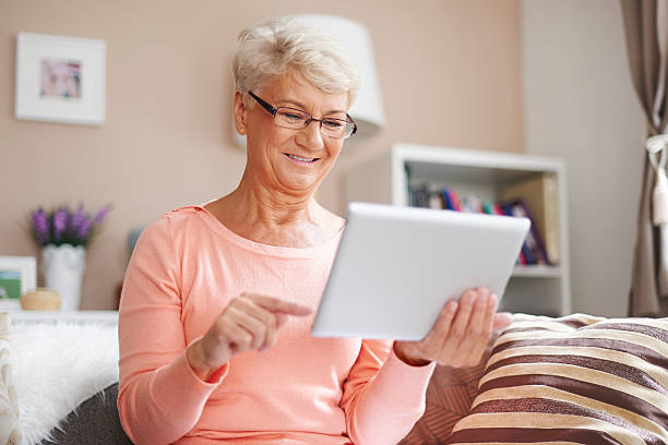 istock Senior woman likes to using contemporary technology 516548857