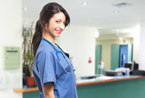 istock Portrait of a beautiful smiling nurse 516548919