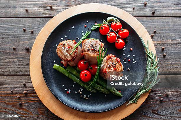 Grilled Pork With Vegetables And Spices Stock Photo - Download Image Now - Plate, Pork, Gourmet