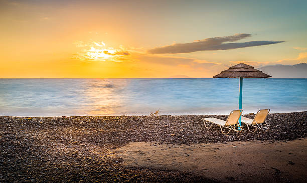 istock Sunloungers at sunrise 516552738