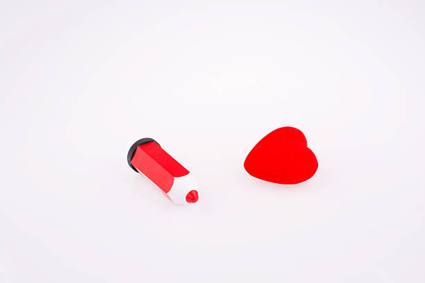 Red heart near a red pen