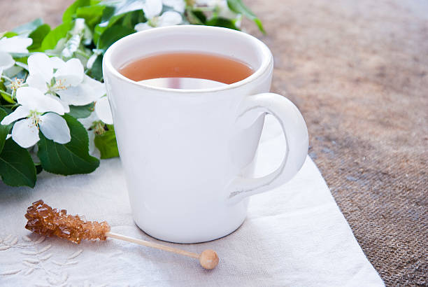 taza de té verde y flores - green tea cherry blossom china cup fotografías e imágenes de stock