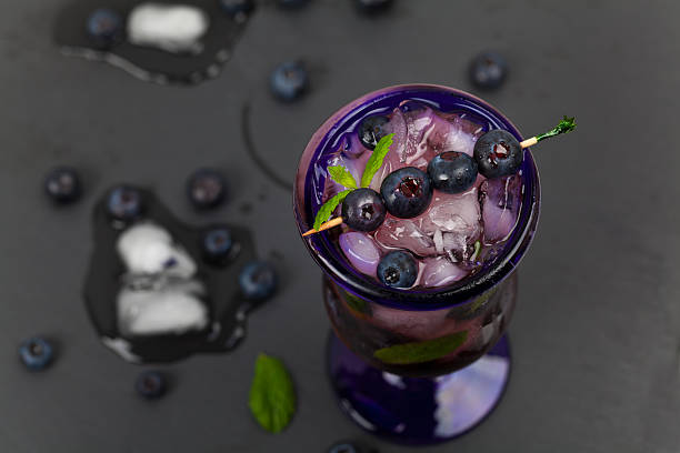 istock Fresh Blueberry Drink with Ice Cubes 516554308