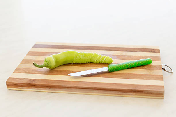 Chopped green pepper on chopping board