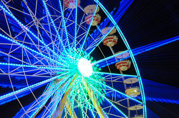 istock colours of ferris wheel 516586701