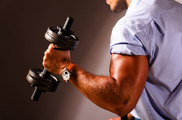 szkolenie biznesowe - businessman exercising training muscular build zdjęcia i obrazy z banku zdjęć