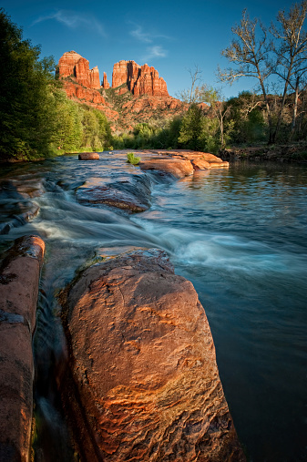 Oak Creek flows peacefully through the red rock canyon of Sedona, Arizona.