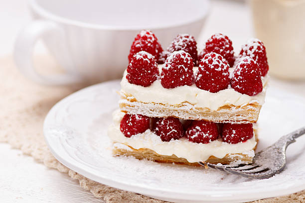 istock Appetizing french millefeuilles raspberry dessert 516589627