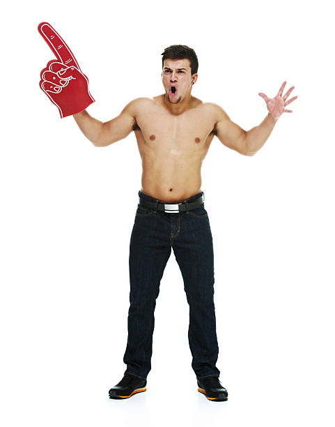 istock Excited man cheering with foam hand 516590405