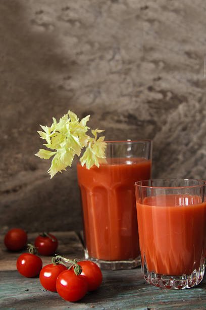 istock Cocktail bar. Bloody Mary with tomatoes and celery 516594860