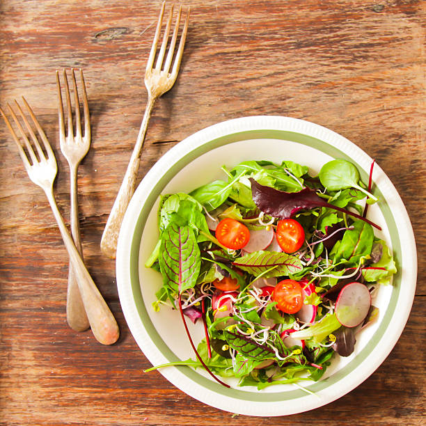 istock salad with tomato and radish sprouts for dinner 516595028