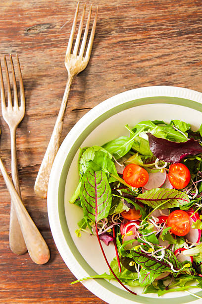 istock salad with tomato and radish sprouts for dinner 516595074