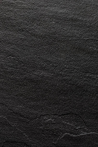 istock Relief surface of natural stone dark tone for the background. 516599560