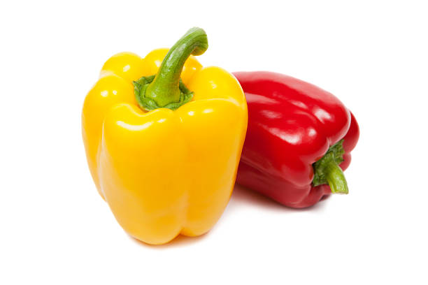 istock Sweet peppers isolated on white 516600042