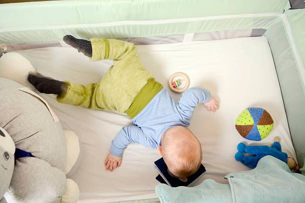 istock baby in the crib 516602954