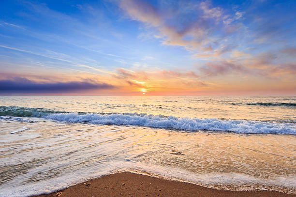 istock Beautiful sunrise over the sea 516604542