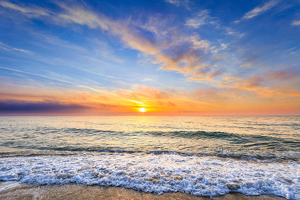 istock Beautiful sunrise over the sea 516604616