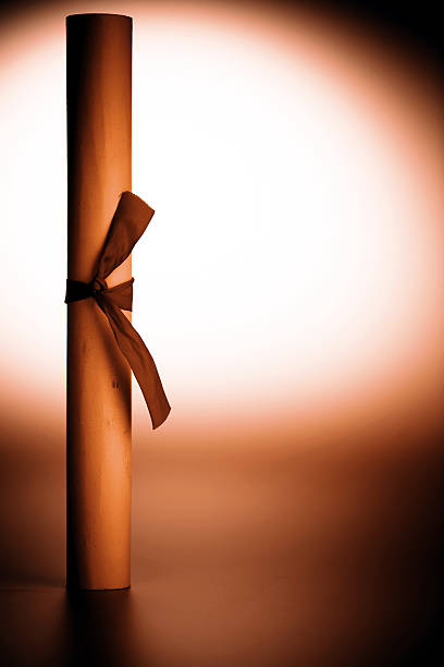 istock scroll of paper - certificate or diploma 516606436