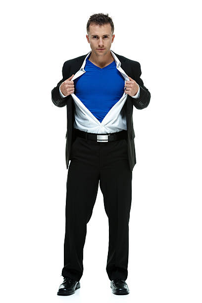 istock Businessman acting like superhero 516614553