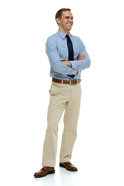 istock Cheerful businessman standing with arms crossed 516614951
